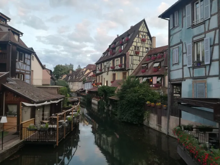 Folklore dancing in the evening at Colmar, Alsace (France)